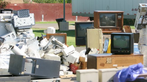 Satisfied customer with a clutter-free home after clearance